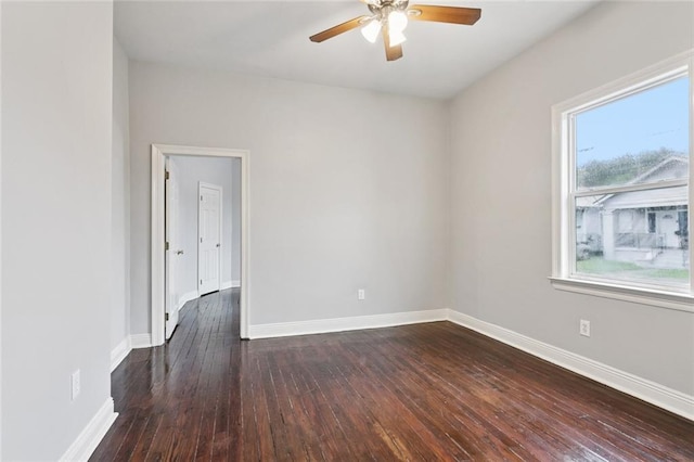 4528-30 Baudin St, New Orleans, LA 70119 - spare room with dark wood finished floors and a ceiling fan