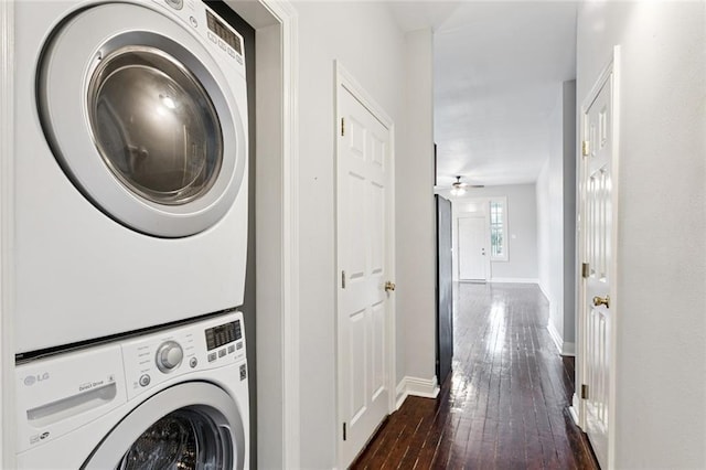 4528-30 Baudin St, New Orleans, LA 70119 - washroom with stacked washing machine and dryer, dark wood-style flooring, and a ceiling fan