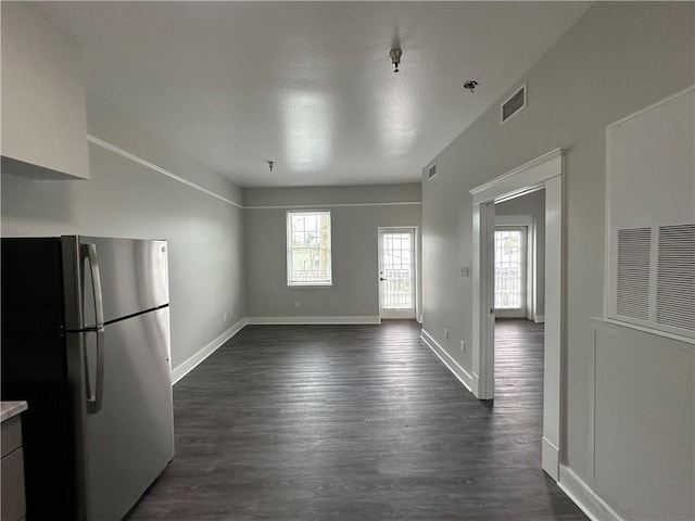 1824 Oretha Castle Haley Blvd Unit 209, New Orleans, LA 70113 - unfurnished living room with dark wood finished floors