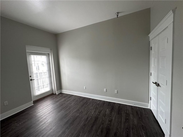 1824 Oretha Castle Haley Blvd Unit 209, New Orleans, LA 70113 - unfurnished room with dark wood-style floors