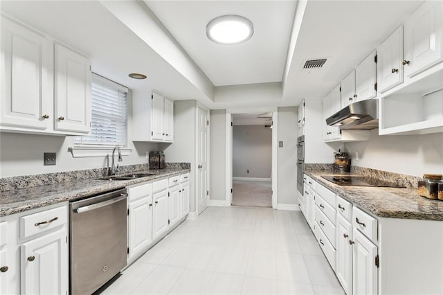 4480 Lennox Blvd, New Orleans, LA 70131 - kitchen featuring dishwasher, under cabinet range hood, black electric stovetop, and white cabinetry