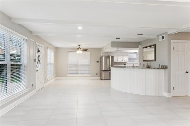 4480 Lennox Blvd, New Orleans, LA 70131 - unfurnished living room featuring beam ceiling, ceiling fan, and light tile patterned floors