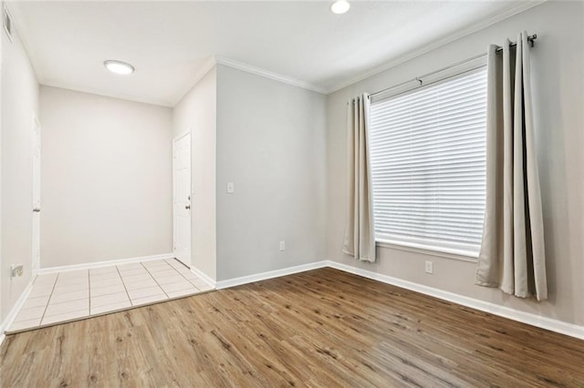 350 Emerald Forest Blvd Unit 6101, Covington, LA 70433 - spare room with wood finished floors and ornamental molding