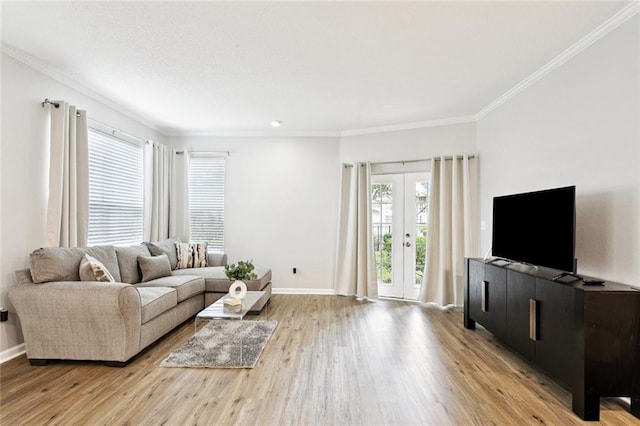 350 Emerald Forest Blvd Unit 6101, Covington, LA 70433 - living area featuring light wood-style flooring, crown molding, and french doors