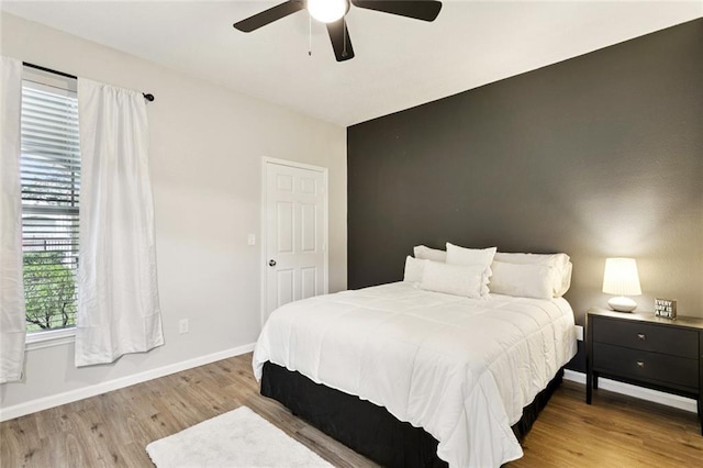 350 Emerald Forest Blvd Unit 6101, Covington, LA 70433 - bedroom with wood finished floors and ceiling fan