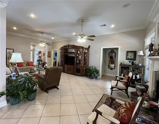 725 Marlene Dr, Gretna, LA 70056 - living room featuring ceiling fan, light tile patterned floors, a premium fireplace, crown molding, and recessed lighting