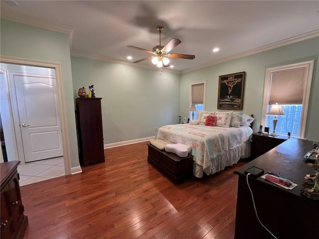 725 Marlene Dr, Gretna, LA 70056 - bedroom with crown molding, hardwood / wood-style floors, recessed lighting, and ceiling fan
