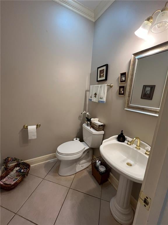 725 Marlene Dr, Gretna, LA 70056 - bathroom with crown molding and tile patterned floors