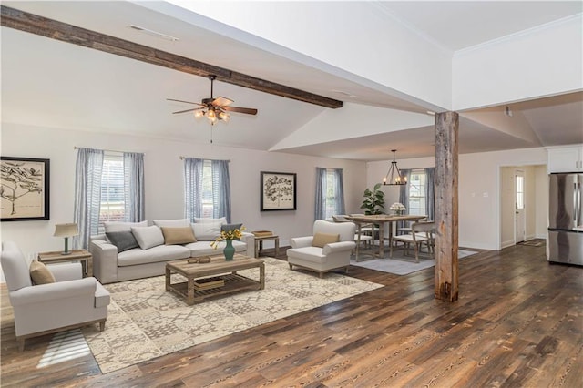 119 Ivy Dr, Covington, LA 70433 - living room featuring dark wood-type flooring, a ceiling fan, and a chandelier