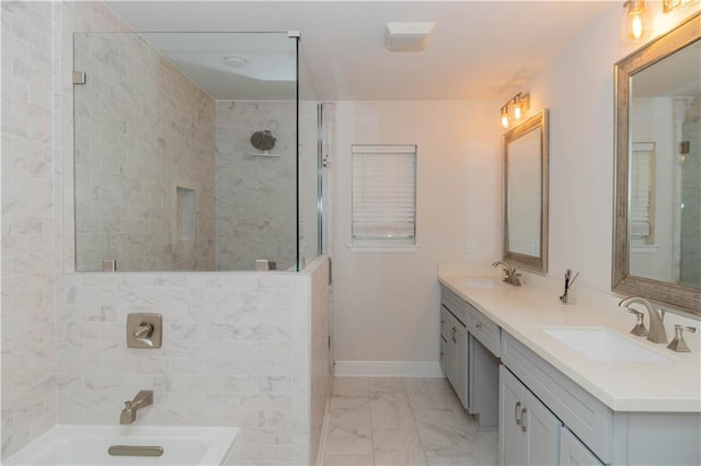 119 Ivy Dr, Covington, LA 70433 - bathroom with double vanity, a bath, tiled shower, and marble look tiles