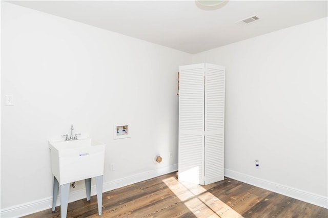 119 Ivy Dr, Covington, LA 70433 - laundry room featuring hookup for a washing machine and wood finished floors