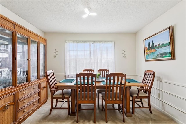 872 Bellemeade Blvd, Gretna, LA 70056 - dining room featuring a textured ceiling and light colored carpet