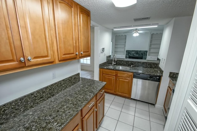 3320 Taft Park Unit C, Metairie, LA 70002 - kitchen with ceiling fan, light tile patterned floors, stainless steel dishwasher, a textured ceiling, and dark stone countertops