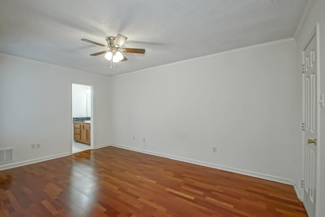 3320 Taft Park Unit C, Metairie, LA 70002 - unfurnished bedroom featuring wood finished floors, ornamental molding, ensuite bathroom, and ceiling fan