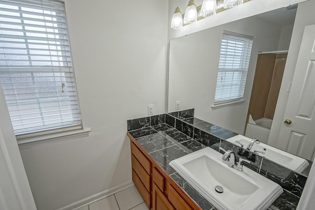3320 Taft Park Unit C, Metairie, LA 70002 - full bathroom featuring plenty of natural light, vanity, bathing tub / shower combination, and tile patterned flooring