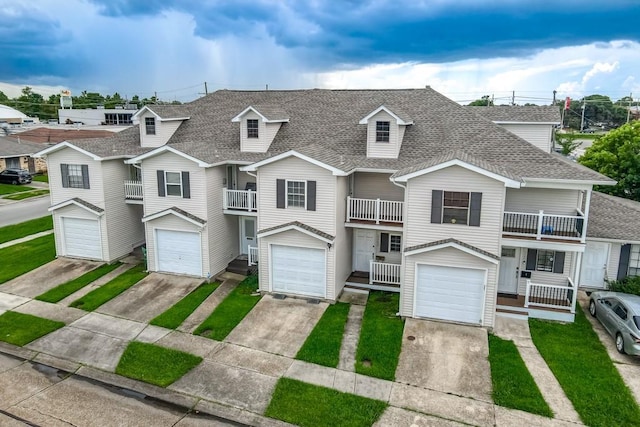 3320 Taft Park Unit C, Metairie, LA 70002 - view of front of property featuring a shingled roof, a garage, and driveway