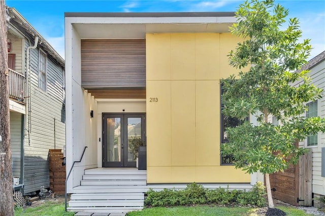 2113 Harmony St, New Orleans, LA 70115 - view of exterior entry featuring french doors