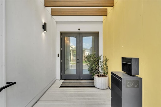 2113 Harmony St, New Orleans, LA 70115 - property entrance with french doors and stucco siding