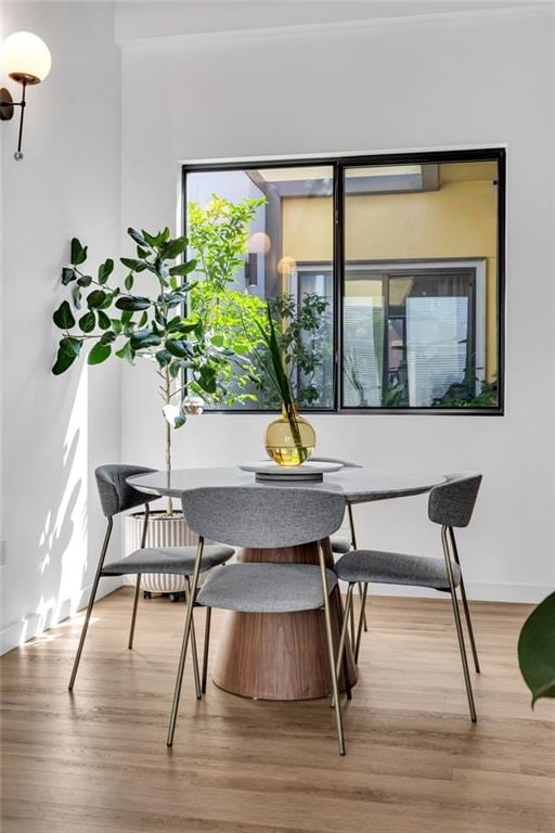 2113 Harmony St, New Orleans, LA 70115 - dining area with wood finished floors