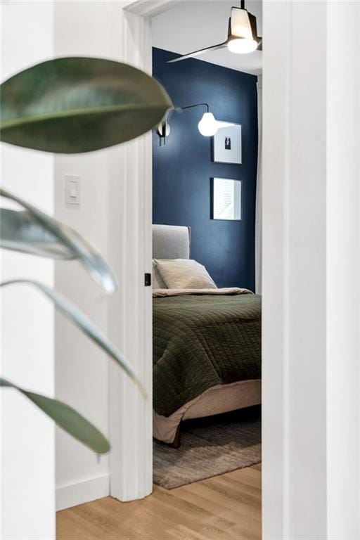 2113 Harmony St, New Orleans, LA 70115 - bedroom featuring light wood-style floors