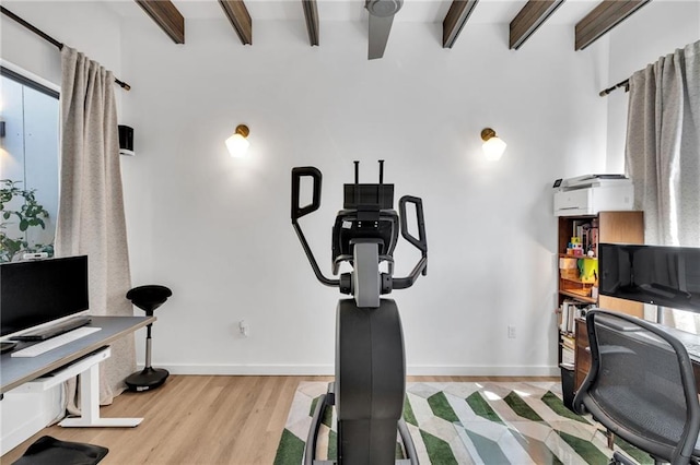 2113 Harmony St, New Orleans, LA 70115 - workout area featuring wood finished floors and baseboards