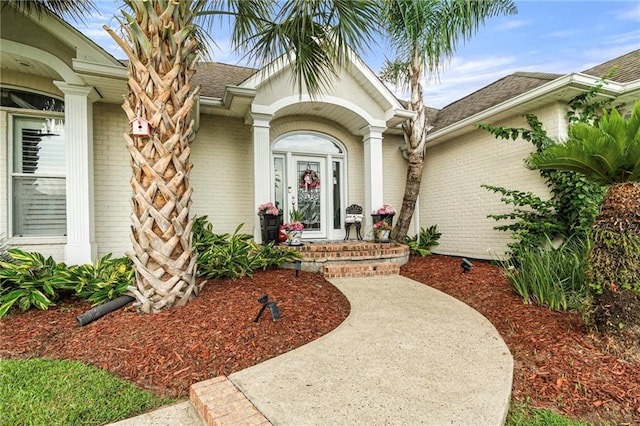 3913 Lake Providence Dr, Harvey, LA 70058 - doorway to property with brick siding and roof with shingles