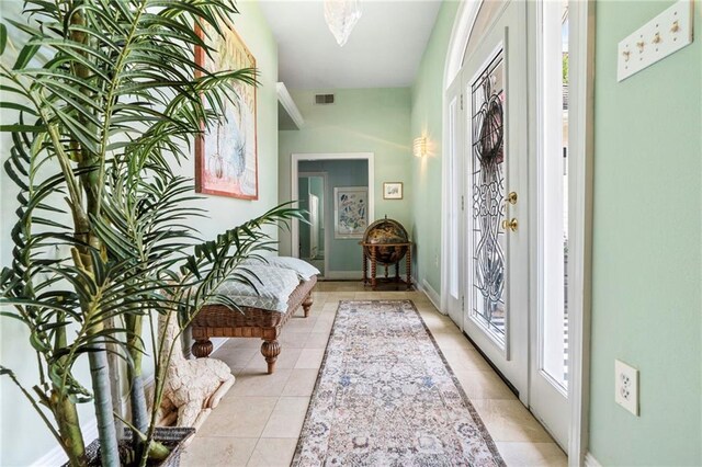 3913 Lake Providence Dr, Harvey, LA 70058 - entryway featuring light tile patterned floors and baseboards