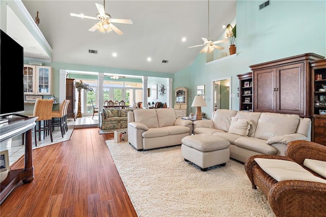 3913 Lake Providence Dr, Harvey, LA 70058 - living room with ceiling fan, high vaulted ceiling, wood finished floors, and recessed lighting