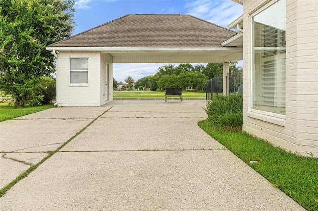 3913 Lake Providence Dr, Harvey, LA 70058 - view of property's community featuring concrete driveway and a carport