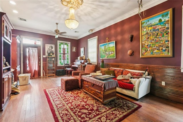 834 Madison St, Gretna, LA 70053 - living area with hardwood / wood-style floors, a ceiling fan, and crown molding