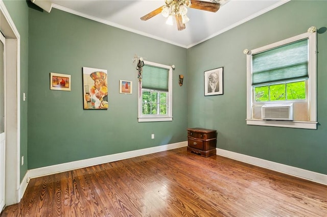 834 Madison St, Gretna, LA 70053 - spare room featuring ceiling fan, wood finished floors, and crown molding