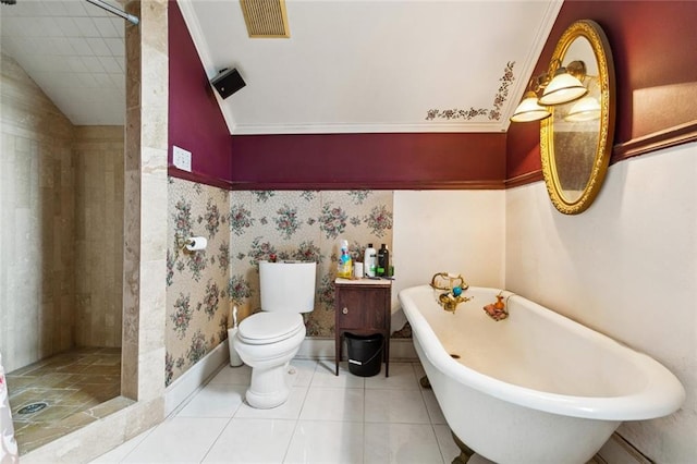 834 Madison St, Gretna, LA 70053 - bathroom with a soaking tub, a shower stall, tile patterned flooring, and vaulted ceiling