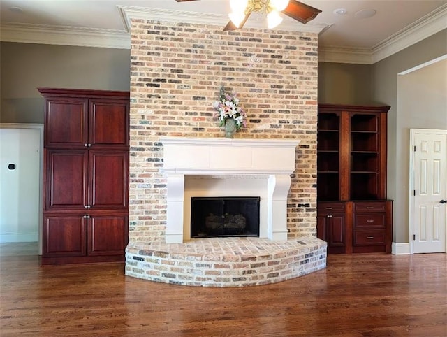 11 Mark Smith Dr, Mandeville, LA 70471 - unfurnished living room with ceiling fan, wood finished floors, ornamental molding, and a brick fireplace