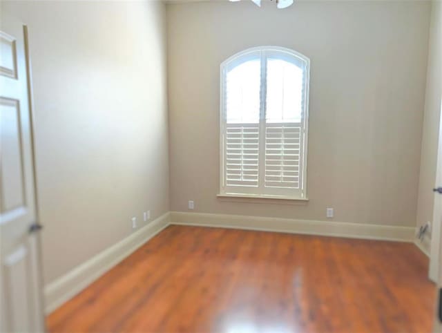 11 Mark Smith Dr, Mandeville, LA 70471 - empty room with baseboards and wood finished floors