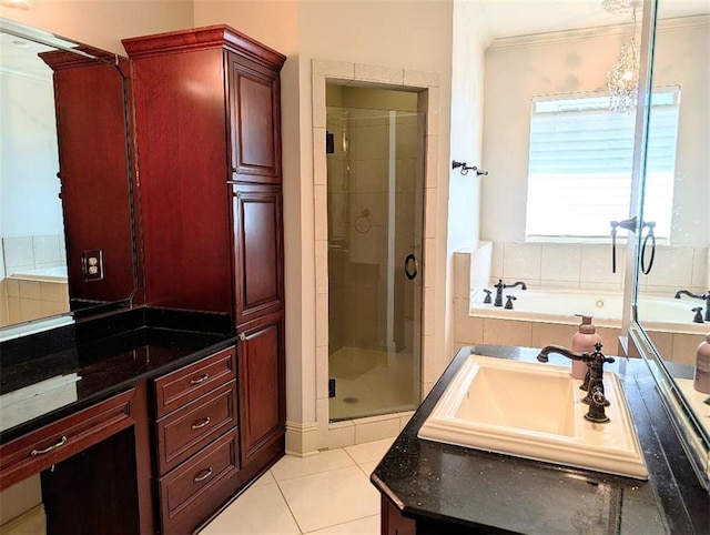 11 Mark Smith Dr, Mandeville, LA 70471 - full bathroom with vanity, crown molding, a shower stall, a bath, and tile patterned flooring