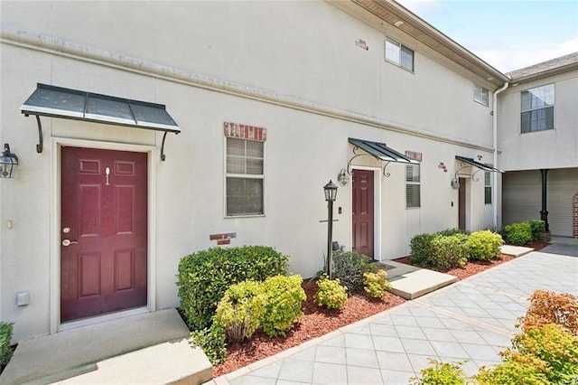 4512 Pontchartrain Dr Unit 2, Slidell, LA 70458 - property entrance featuring stucco siding