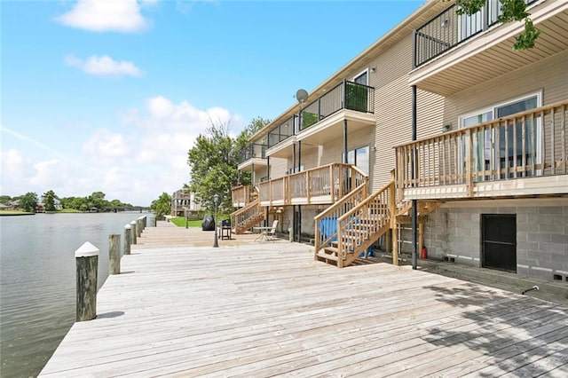 4512 Pontchartrain Dr Unit 2, Slidell, LA 70458 - dock area with a balcony, stairway, and a deck with water view