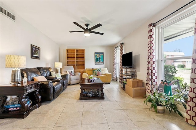 1109 Andrews Ave, Metairie, LA 70005 - living area featuring a ceiling fan, tile patterned floors, plenty of natural light, and built in shelves