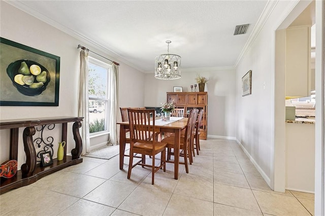 1109 Andrews Ave, Metairie, LA 70005 - dining area with a chandelier, ornamental molding, and light tile patterned flooring