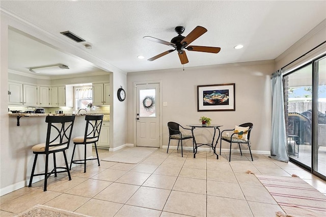 1109 Andrews Ave, Metairie, LA 70005 - dining room featuring crown molding, a ceiling fan, light tile patterned floors, and recessed lighting