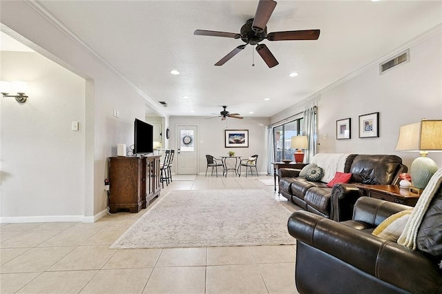 1109 Andrews Ave, Metairie, LA 70005 - living room featuring a ceiling fan, light tile patterned floors, crown molding, and recessed lighting