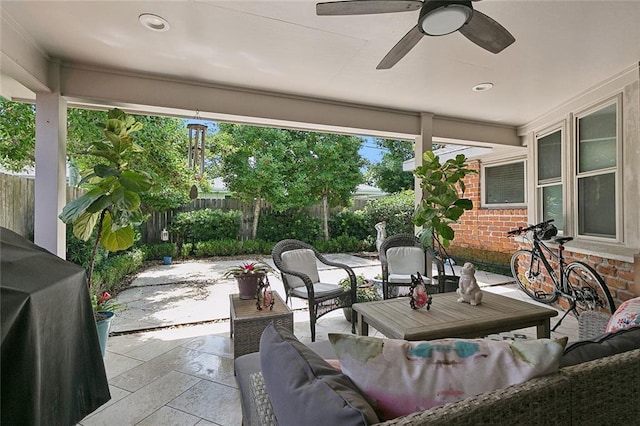 1109 Andrews Ave, Metairie, LA 70005 - fenced backyard with an outdoor living space, ceiling fan, and a patio area