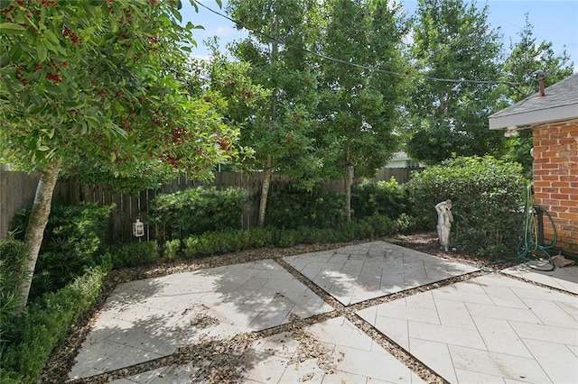 1109 Andrews Ave, Metairie, LA 70005 - fenced backyard with a patio area