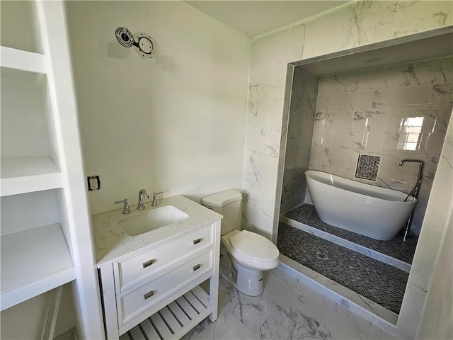 1310 Mazant St, New Orleans, LA 70117 - full bathroom with marble look tile flooring, vanity, and a soaking tub
