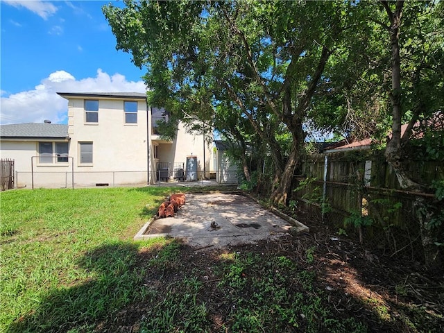 1310 Mazant St, New Orleans, LA 70117 - back of property with stucco siding, a patio, and crawl space