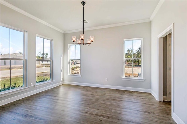 901 Dandelion Dr, Waggaman, LA 70094 - empty room with a chandelier, healthy amount of natural light, dark wood-type flooring, and ornamental molding