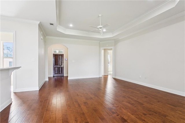 1217 N Starrett Rd, Metairie, LA 70003 - unfurnished room featuring arched walkways, a ceiling fan, wood-type flooring, and crown molding