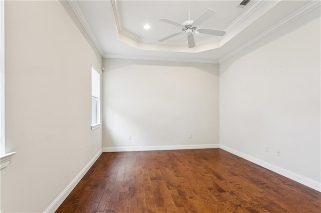 1217 N Starrett Rd, Metairie, LA 70003 - spare room with ceiling fan, wood finished floors, ornamental molding, a tray ceiling, and recessed lighting