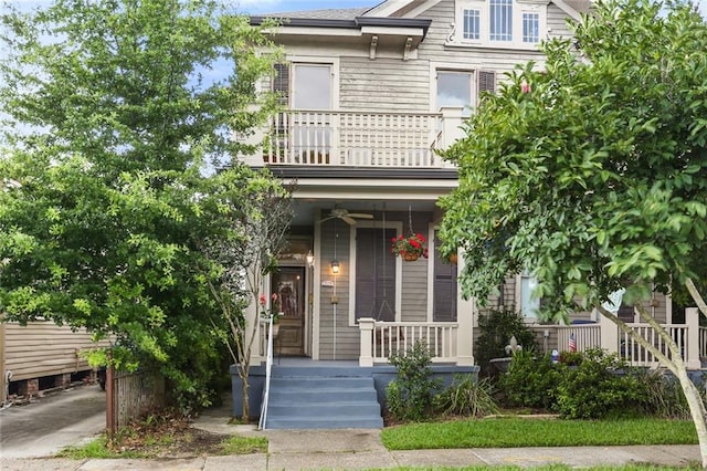 1203 Constantinople St Unit 1, New Orleans, LA 70115 - view of front facade featuring a balcony, covered porch, and ceiling fan