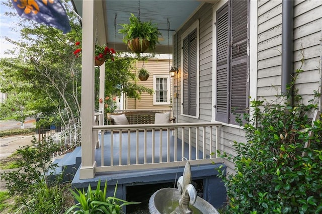 1203 Constantinople St Unit 1, New Orleans, LA 70115 - view of wooden porch